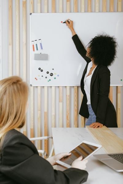 woman at whiteboard